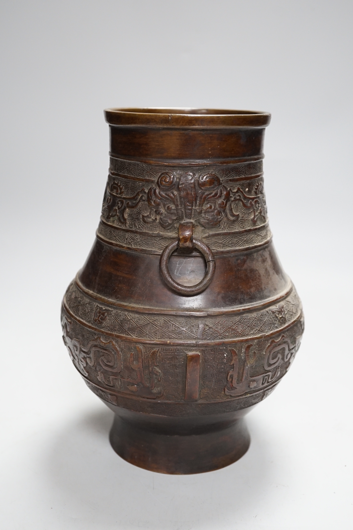 A Chinese archaistic bronze vase, hu, Xuande mark, 19th century, 24cm high